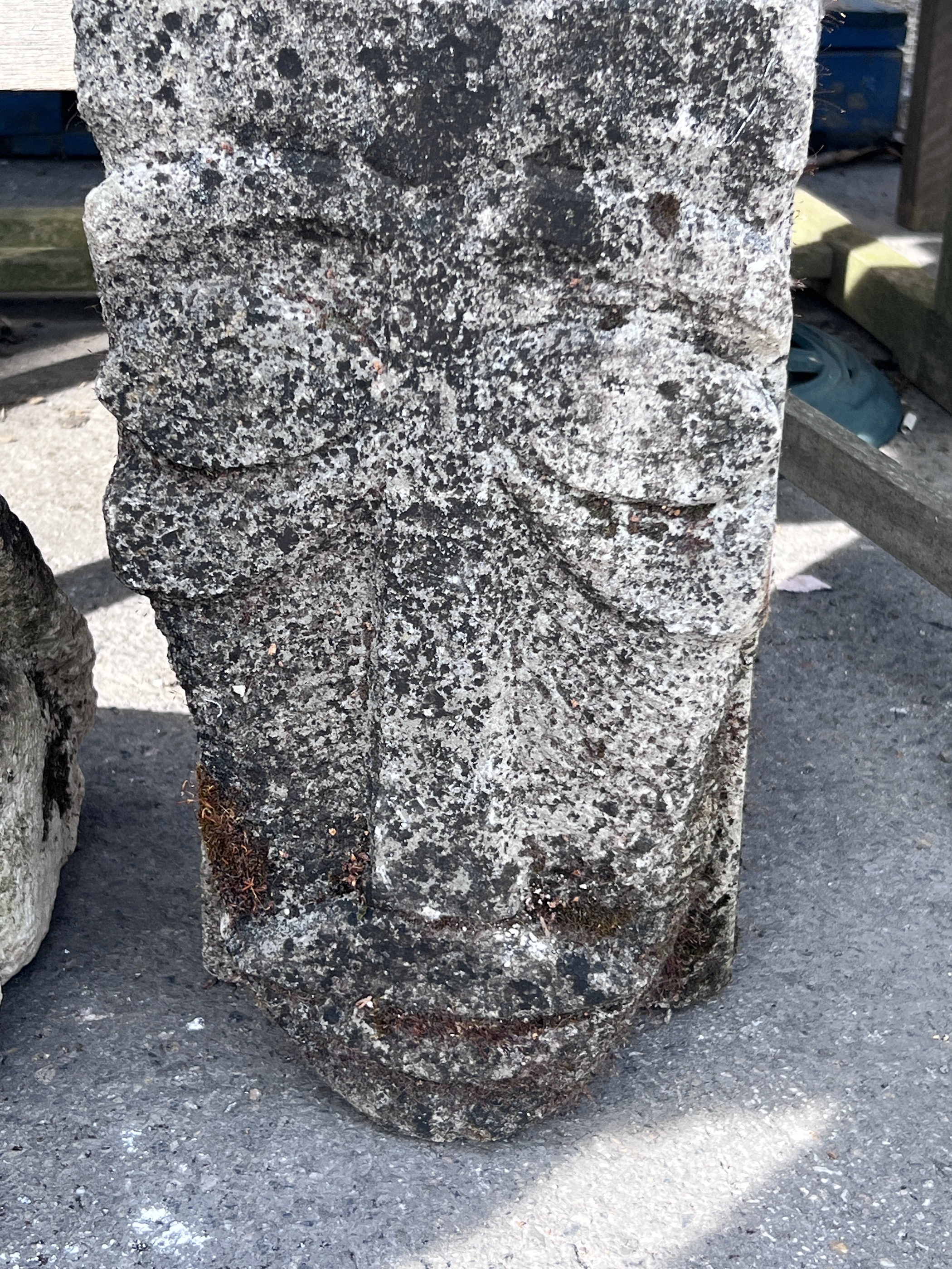 An 'Inca' carved stone head and another of a crouching figure, tallest 43cm
